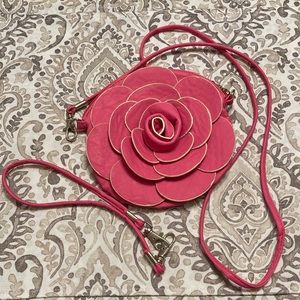 Pretty in pink rose petal crossbody/convertible to a wristlet.
